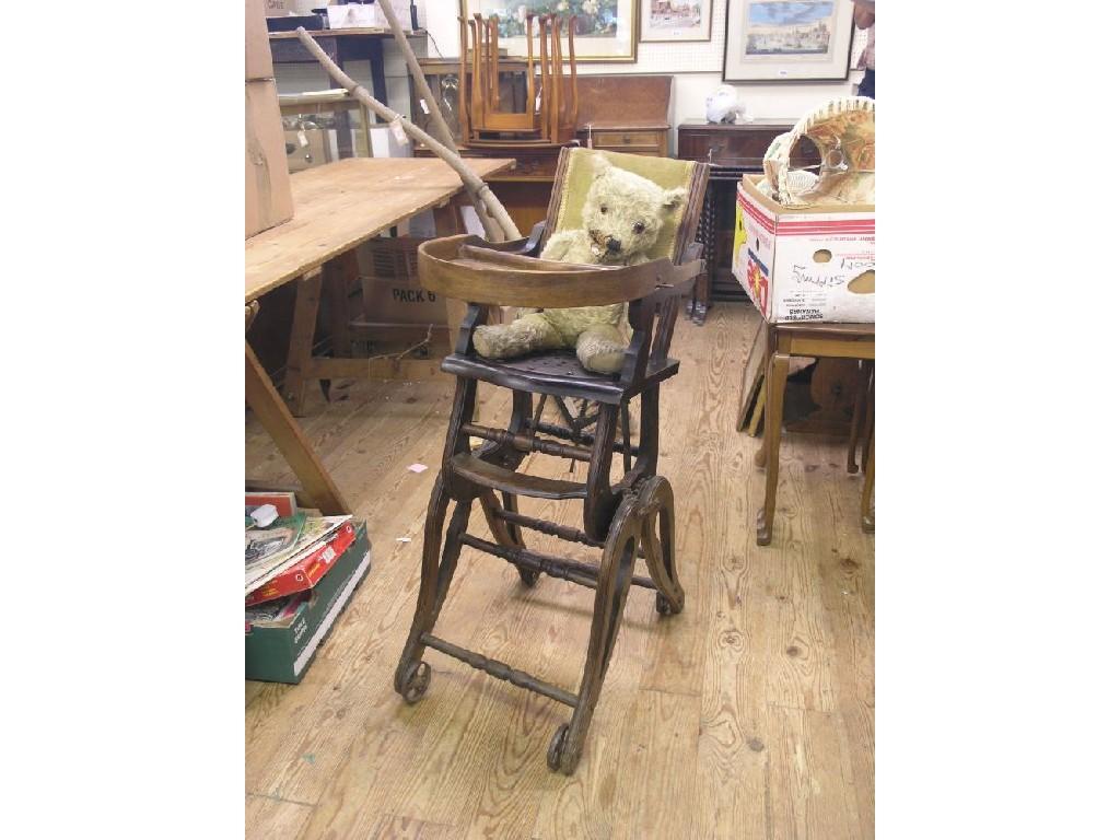 Appraisal: A child's beech mechanical high-chair with upholstered back together with