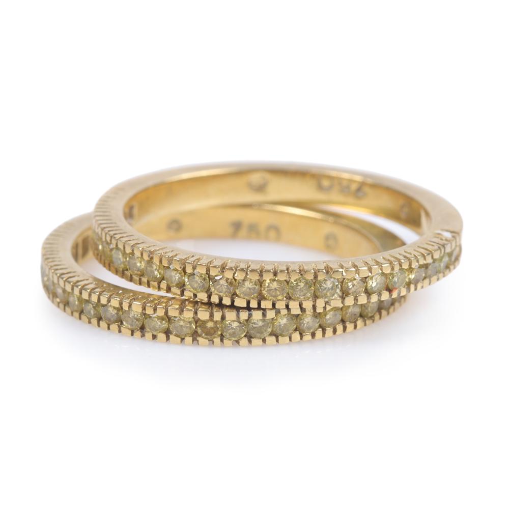 Appraisal: Two stamped k yellow gold fancy yellow diamond stacking rings