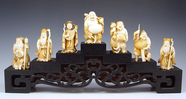 Appraisal: CHINESE CARVED IVORY FIGURES OF THE IMMORTALS Each approx ''h