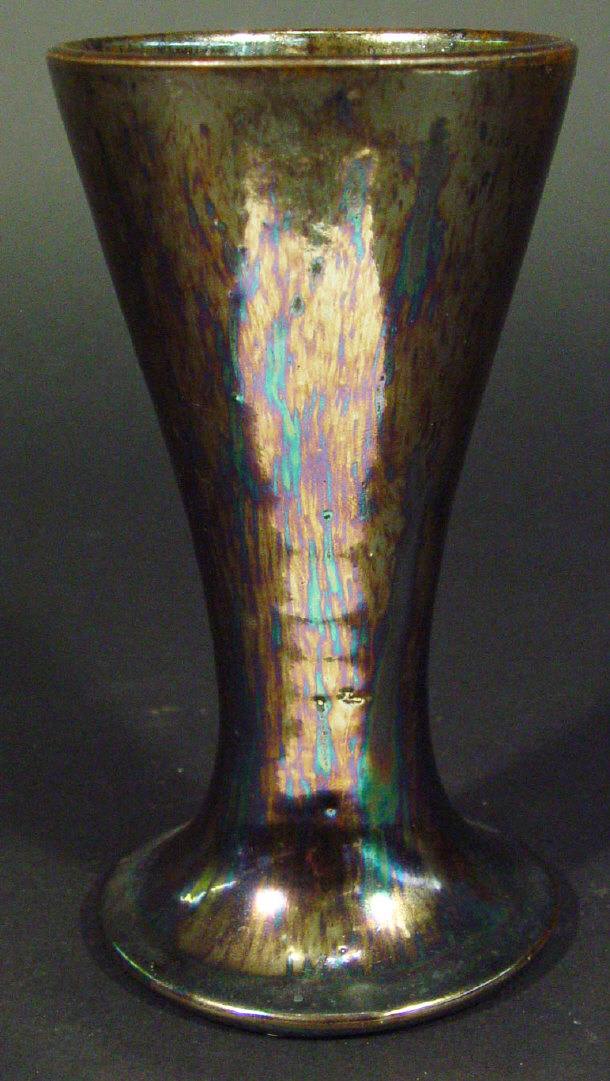 Appraisal: Dickerware vase of tapering form decorated with a black iridescent