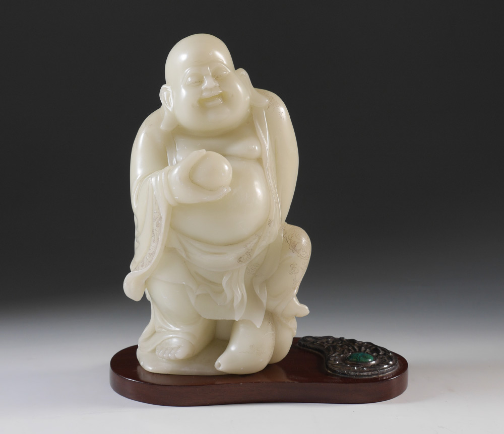 Appraisal: CHINESE CARVED STONE BUDDHA ON STAND Figure of standing Buddha