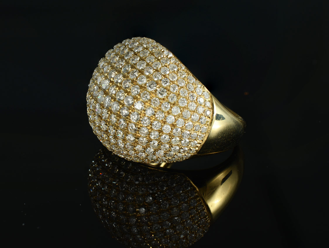 Appraisal: K PAVE DIAMOND RING K yellow gold ring paved in