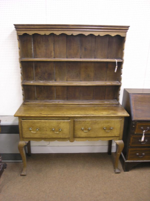 Appraisal: A th century oak dresser with plate rack plate rack