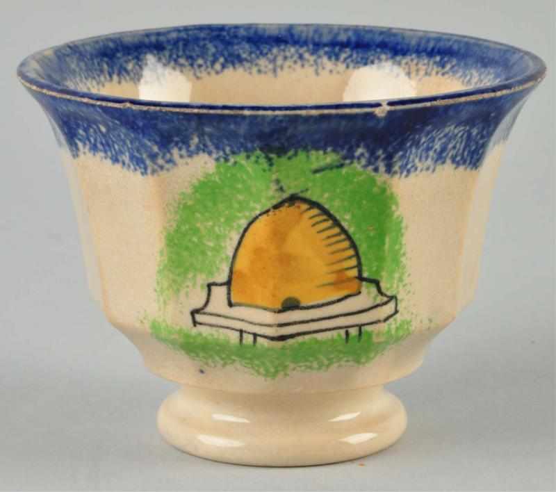 Appraisal: Rare Spatterware Paneled Handless Cup Description Circa Blue with yellow