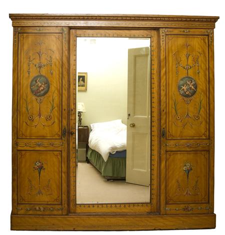 Appraisal: A Victorian painted satinwood wardrobe retailed by James Shoolbred Co