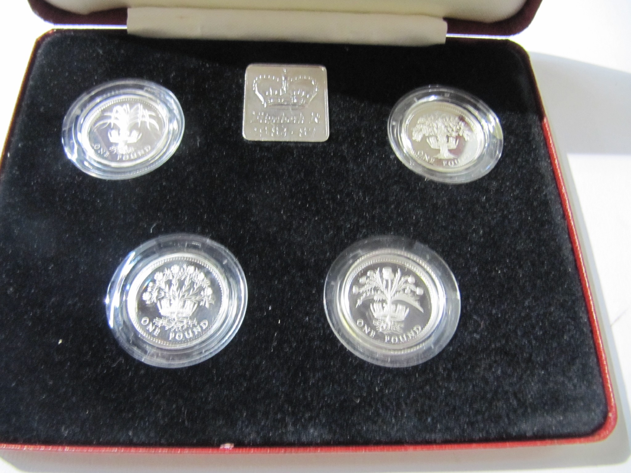 Appraisal: A lot comprising three cased sets of silver proof coins