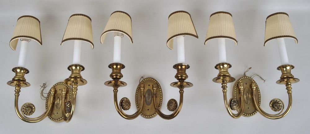 Appraisal: Group Three Neoclassical Style Brass Wall Sconces two arm form