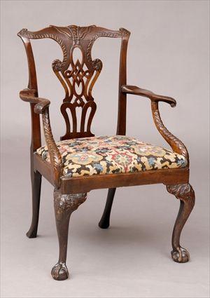 Appraisal: FINE GEORGE II CARVED MAHOGANY OPEN ARMCHAIR WITH NEEDLEPOINT SEAT