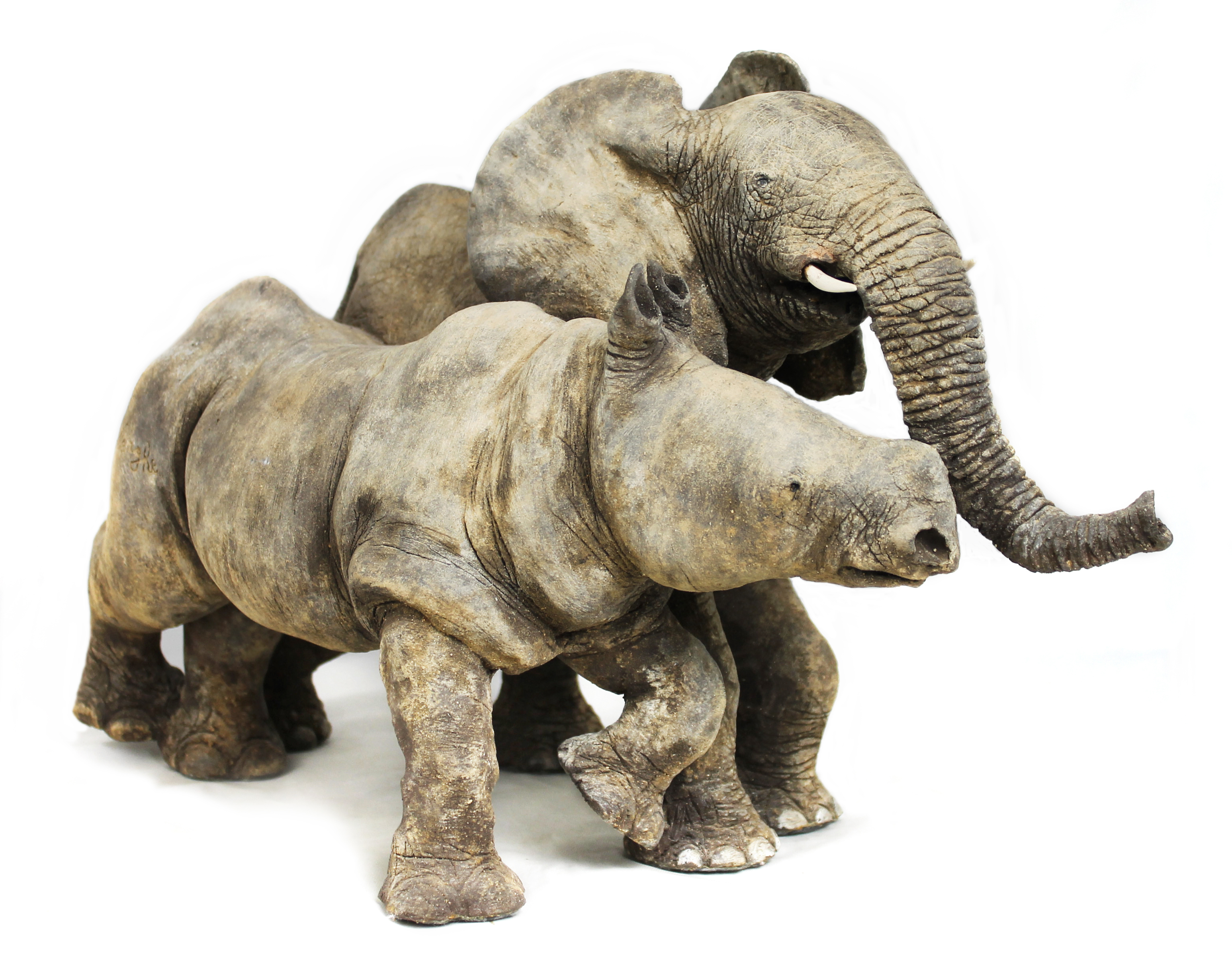 Appraisal: A pottery group of an elephant and rhino th century