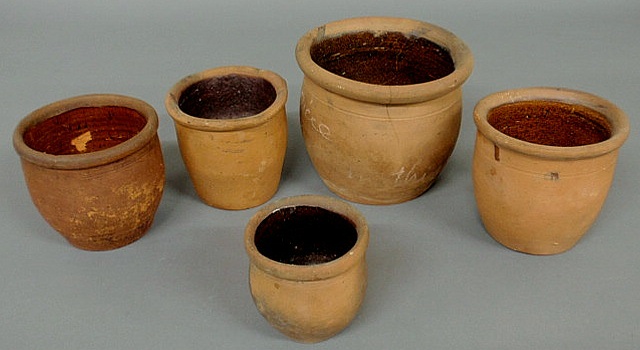 Appraisal: Five th c Pennsylvania unglazed redware jars largest h