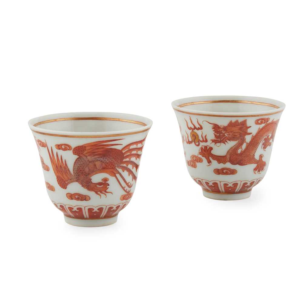 Appraisal: PAIR OF IRON-RED DECORATED CUPS TONGZHI MARK AND OF THE