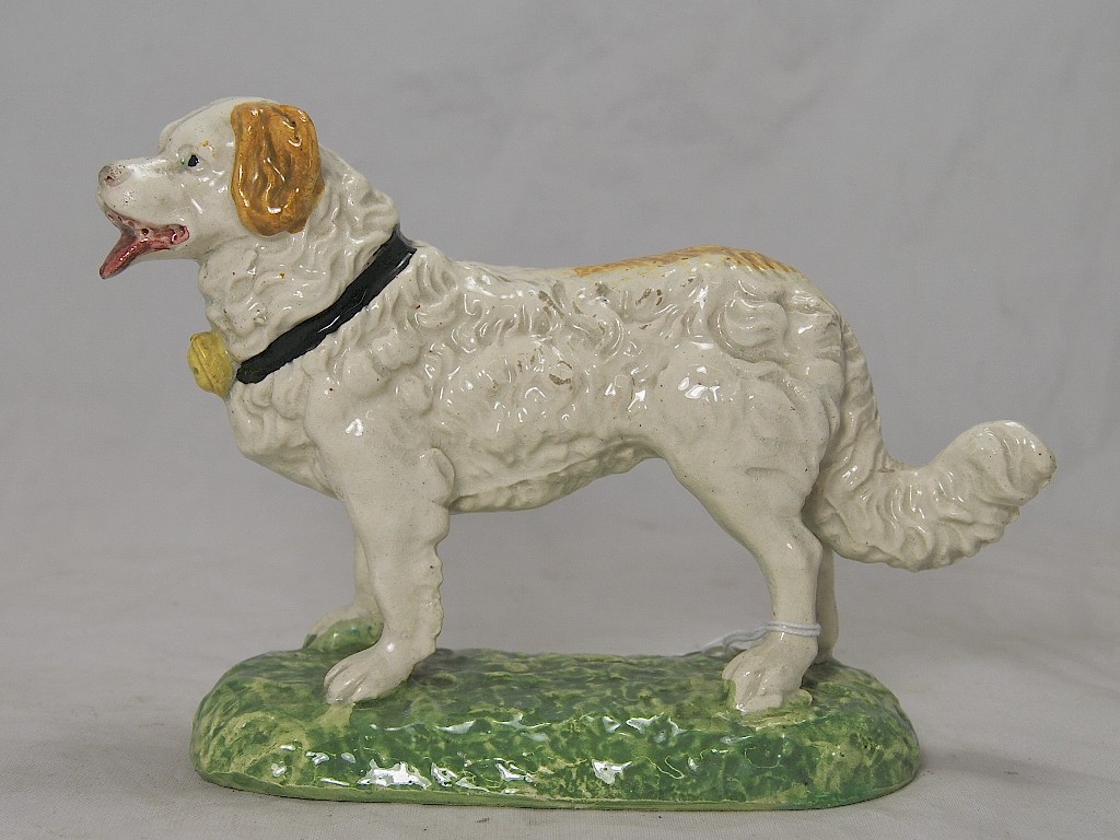 Appraisal: A th century earthenware model of a mountain sheep dog