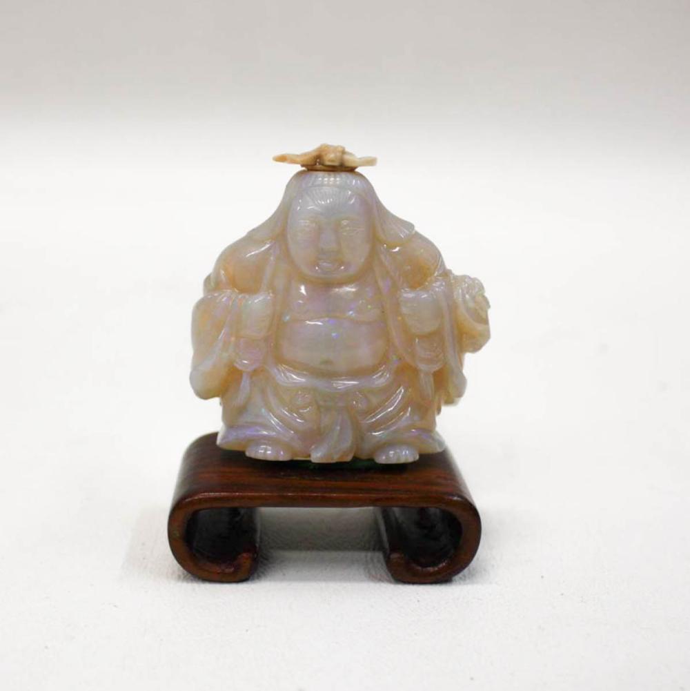 Appraisal: CHINESE CARVED OPAL FIGURAL SNUFF BOTTLE flattened form depicting a