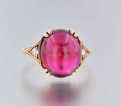 Appraisal: A Ladies' Synthetic Ruby Cabochon and Diamond Ring k yellow