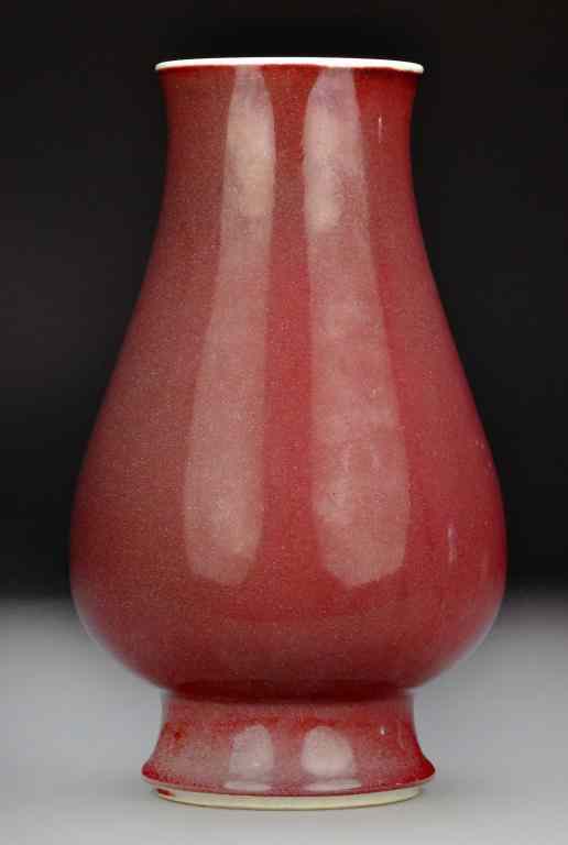 Appraisal: Chinese Strawberry Glaze Porcelain Zun VaseWith slightly flared rim raisd