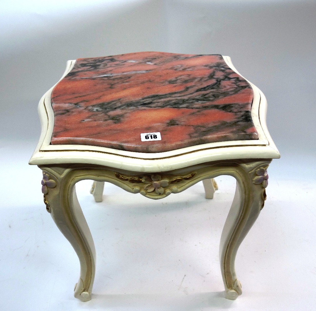 Appraisal: A reproduction Louis XV style low table with carved and