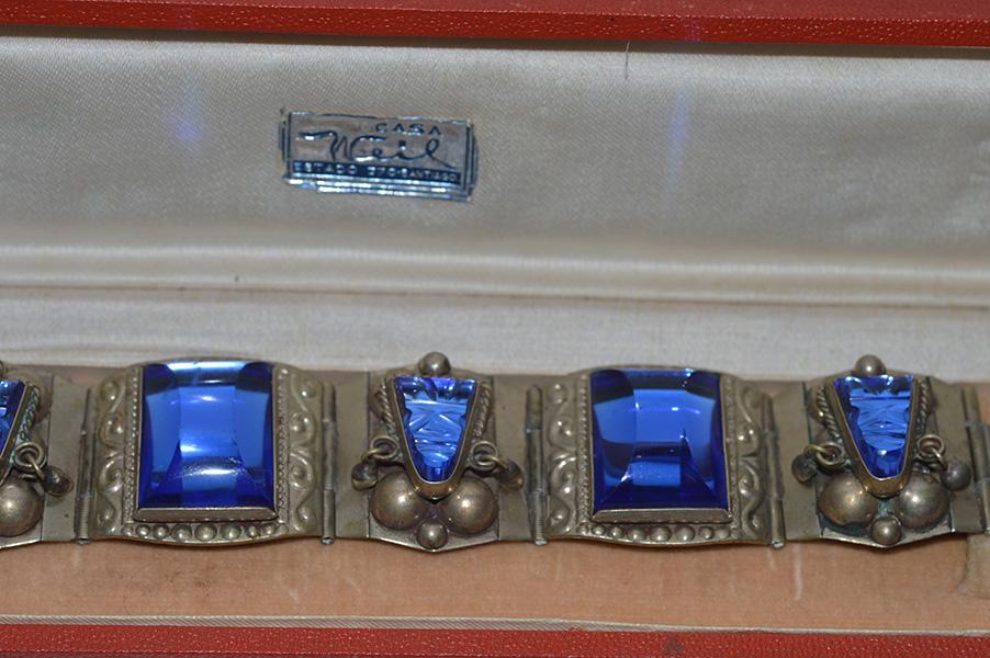 Appraisal: A MEXICAN SILVER PANEL BRACELET SET WITH BLUE PASTE A