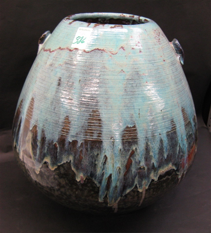 Appraisal: POTTERY FLOOR VASE having over glaze blue shading to black