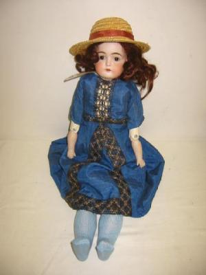 Appraisal: A Kestner bisque shoulder head doll with fixed brown eyes