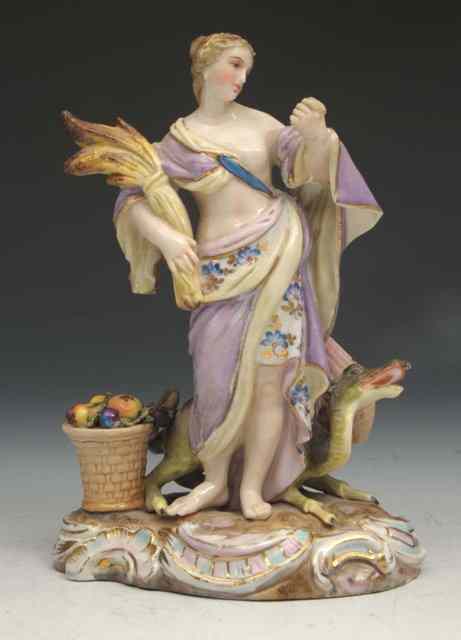 Appraisal: A CONTINENTAL PORCELAIN FIGURE of a woman with a dragon