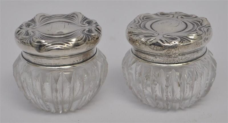 Appraisal: PAIR ART NOUVEAU STERLING SILVER VANITY JARS Late th early