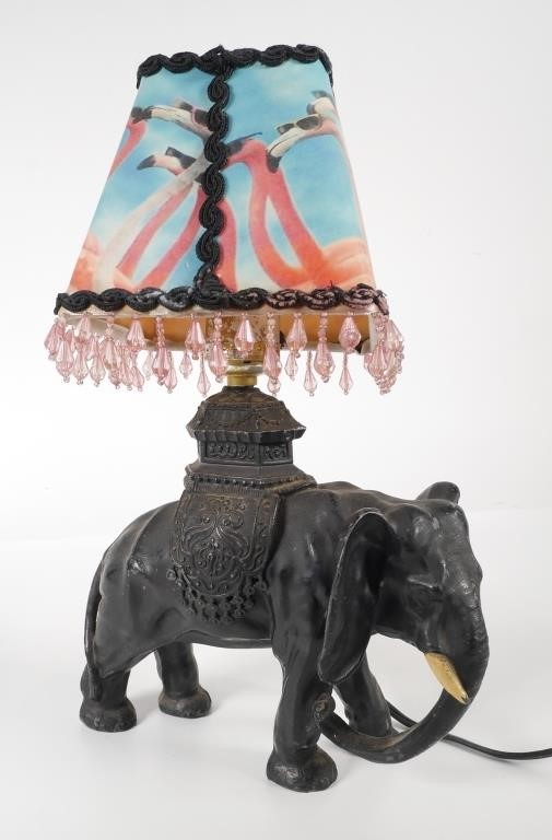 Appraisal: Standing metal elephant lamp painted black with saddle blanket and