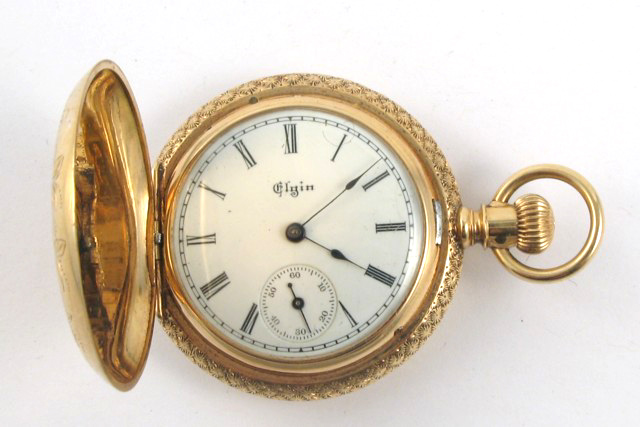 Appraisal: FOURTEEN KARAT GOLD HUNTING CASE POCKET WATCH Elgin Watch Co