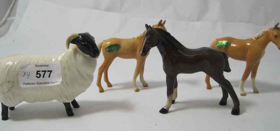 Appraisal: Beswick Brown Small Foal v Palomino Foals And Black Faced