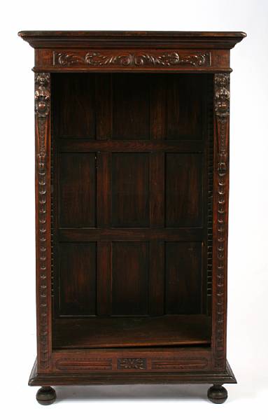 Appraisal: A pair of Renaissance style carved oak open cabinets height