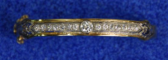 Appraisal: K YELLOW AND WHITE GOLD AND DIAMOND BANGLE BRACELET the