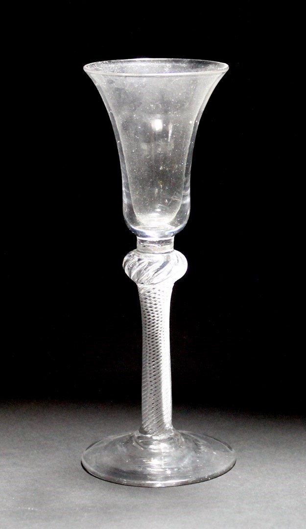 Appraisal: An airtwist wine glass circa the bell bowl raised on