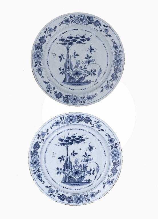 Appraisal: A PAIR OF ENGLISH DELFTWARE DISHES PROBABLY LONDON painted in