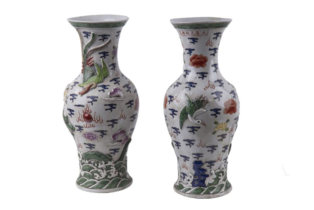 Appraisal: PAIR OF CHINESE PORCELAIN VASESeach with relief design inches high