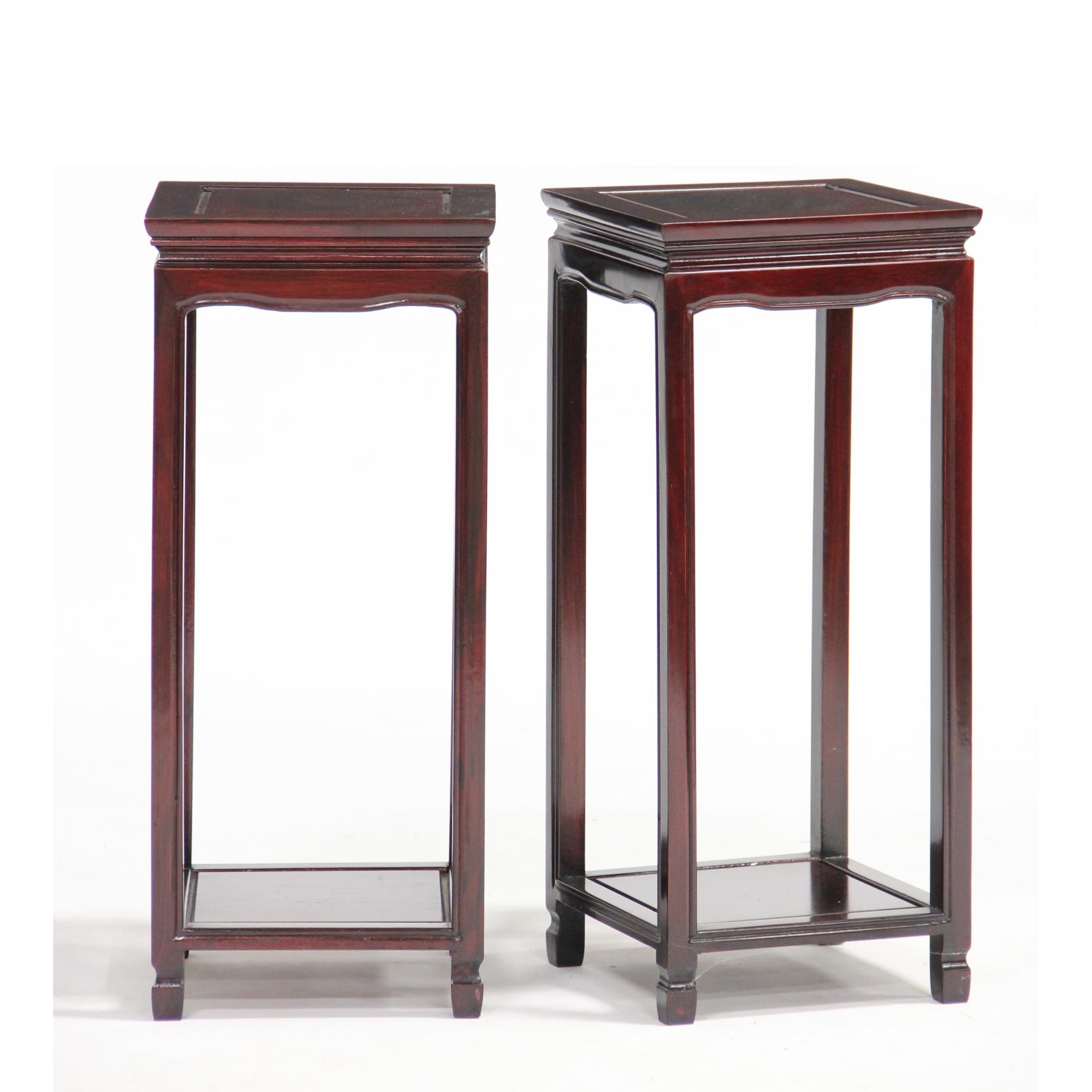 Appraisal: Pair of Chinese Hardwood Stands late th century paneled top