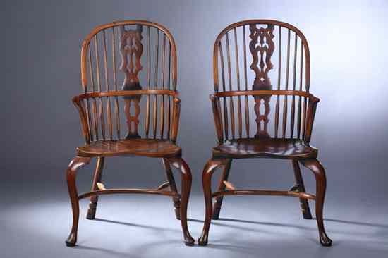 Appraisal: PAIR GEORGE III STYLE YEW WOOD WINDSOR CHAIRS Central pierced