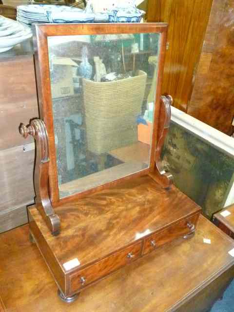 Appraisal: A VICTORIAN MAHOGANY SWING DRESSING TABLE MIRROR the mirror on