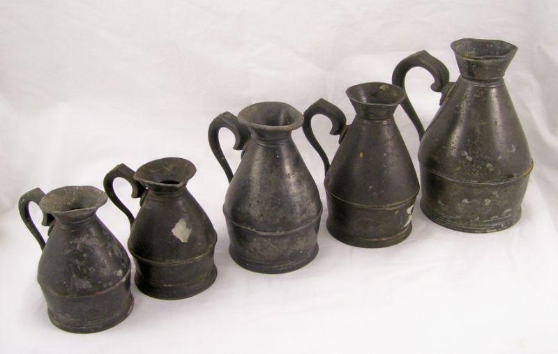 Appraisal: Pewter Graduated Measures Lot includes One pint measures high -