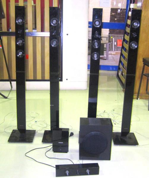 Appraisal: A SAMSUNG SPEAKER SYSTEM FOUR UPRIGHT SPEAKERS SUB WOOFER WIRELESS