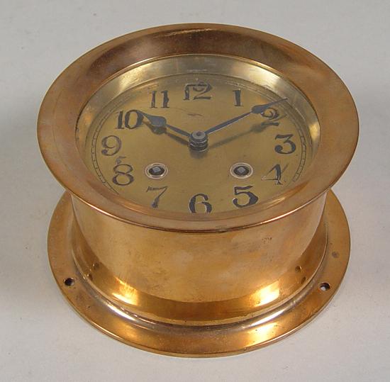 Appraisal: Brass Bell Watch Company Ship's Clock Brass case and brass