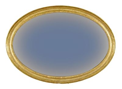 Appraisal: An oval giltwood and gesso wall mirror with leaf and