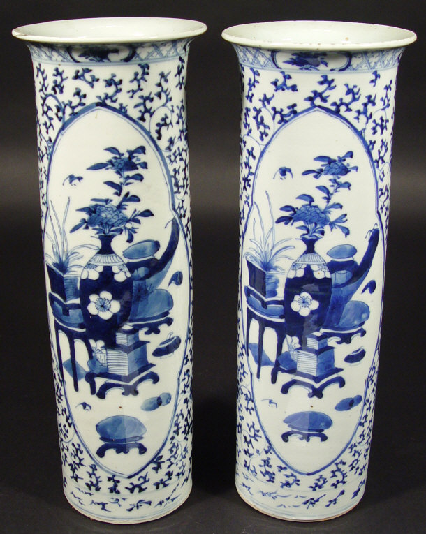 Appraisal: Pair of Oriental cylindrical porcelain vases each painted in blue