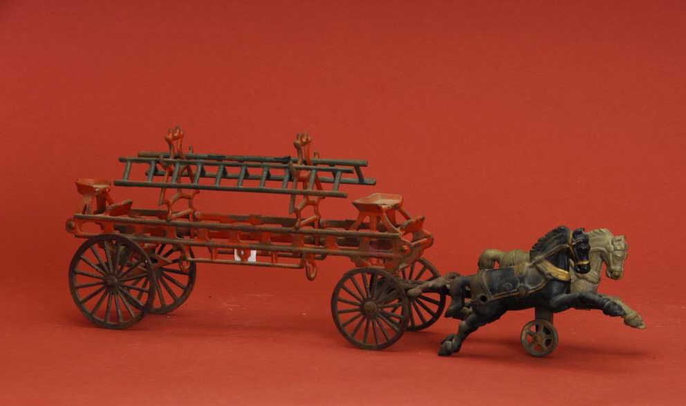 Appraisal: Cast Iron Horse-Drawn Ladder Wagon America ca cast iron double