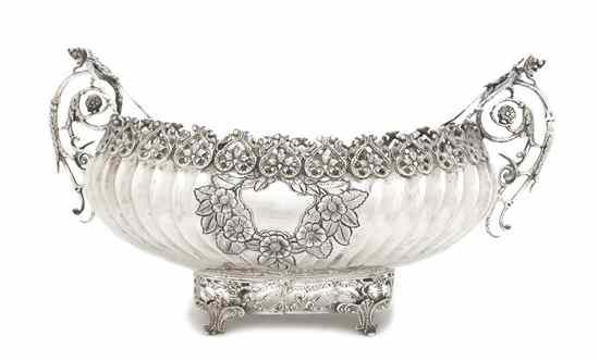 Appraisal: A Continental Silver Centerbowl of oval handled form having pierced