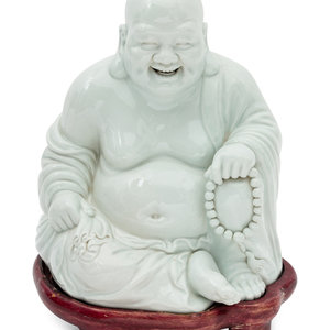 Appraisal: A Blanc De Chine Seated Buddha th Century on a