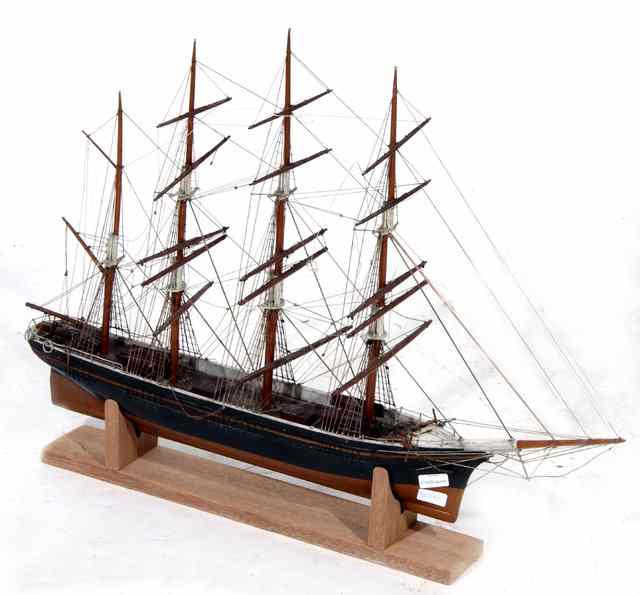 Appraisal: AN OLD HAND BUILT MODEL OF A FOUR MASTED SAILING