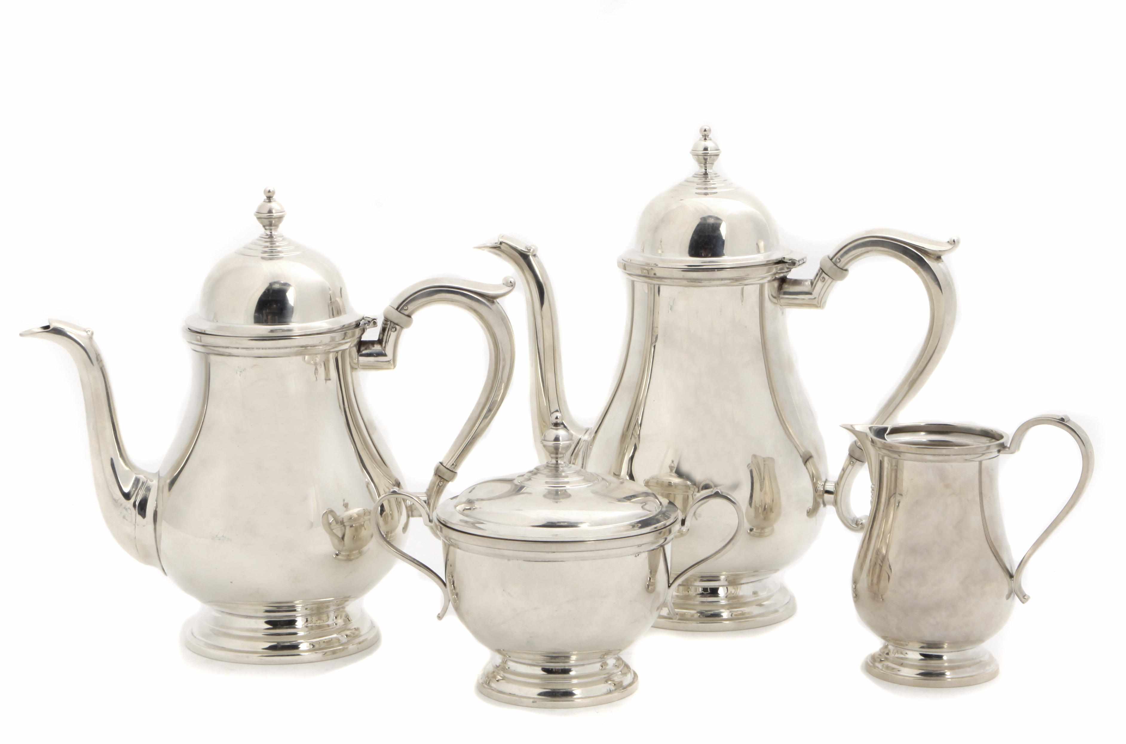 Appraisal: An American sterling silver Colonial Revival four piece tea and