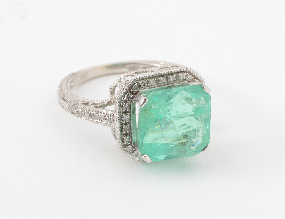 Appraisal: EMERALD AND DIAMOND RING At the center of this K