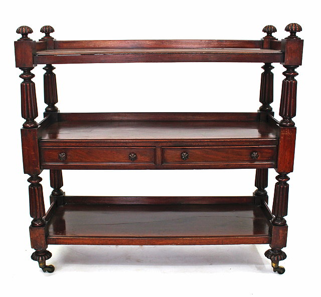 Appraisal: A TH CENTURY MAHOGANY THREE TIER BUFFET with reeded column