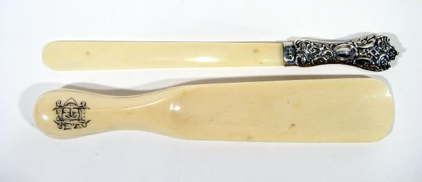 Appraisal: Ivory shoe horn and a silver handled ivory letter knife