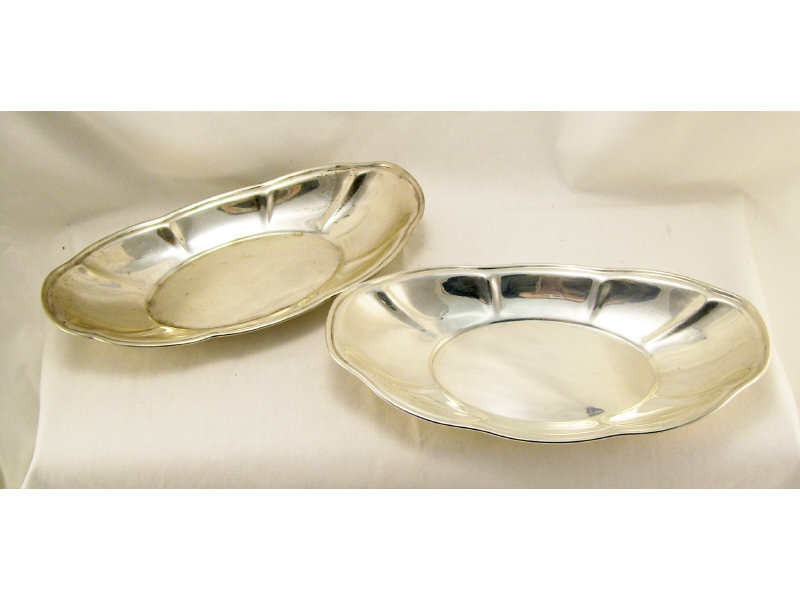 Appraisal: Pair of Sterling Bread Trays Pair of matching sterling bread